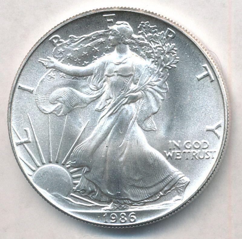 1986 American Silver Eagle MS69 1 oz Silver Coin: Winner shall receive the exact coin shown here. This coin has been graded by our in-house numismatic grader.