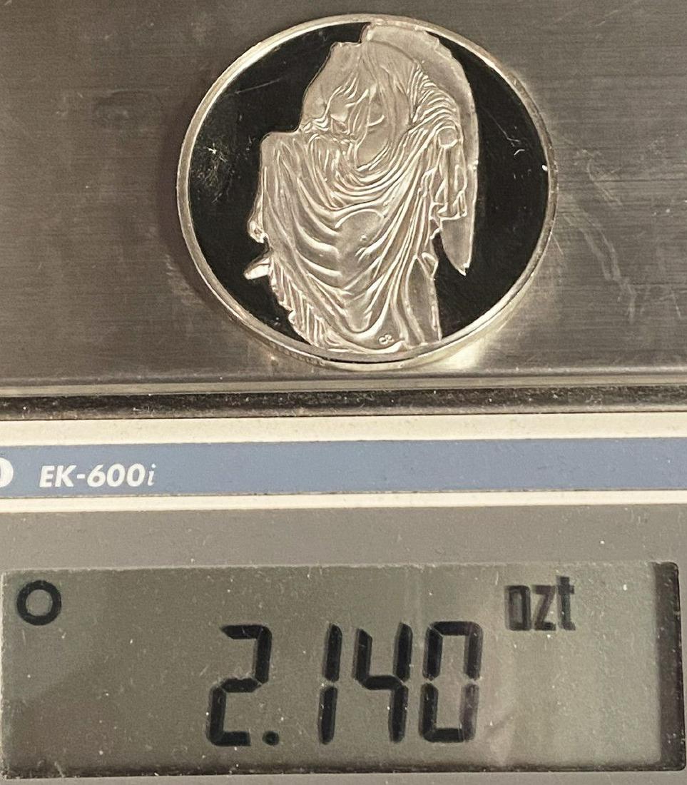 "Nike Adjusting Her Sandal" Huge Sterling Silver Medal: The diameter of this coin is measured to be exactly 2 inches.Winner shall receive the exact coin shown here.