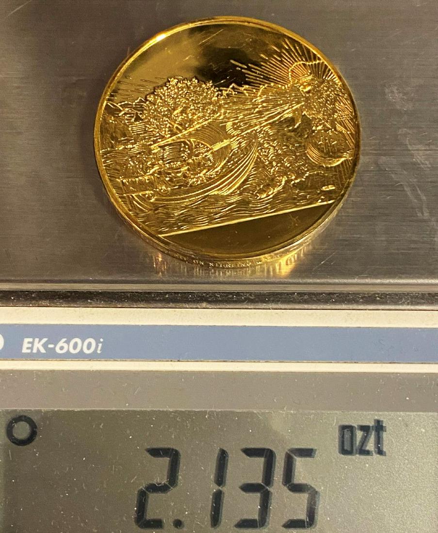 Wolf Directing a Boat Huge Sterling Golden Silver Medal: "Allegory of the Wolf Directing a Boat to a Crowned Eagle on a Globe," HUGE sterling golden silver medal.This is a silver sterling medal plated with 24 karat gold. The diameter of this coin is measure