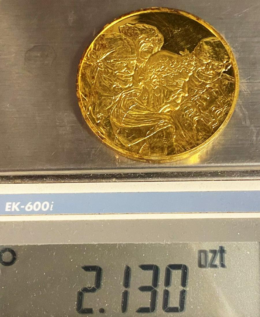 "Five Grotesque Heads" Sterling Golden Silver Medal: This is a silver sterling medal plated with 24 karat gold. The diameter of this coin is measured to be exactly 2 inches.Winner shall receive the exact coin shown here.