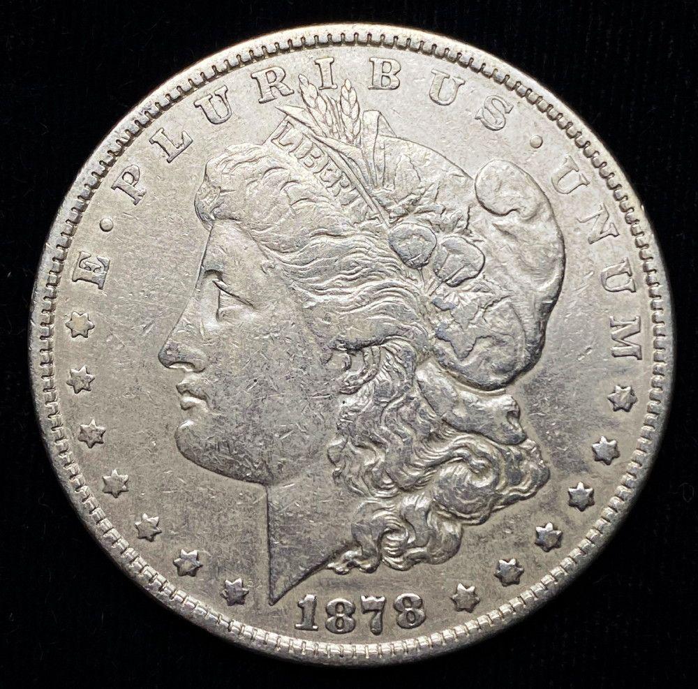1878 7 Tail Feather Rev 79 Morgan Silver $1 Mint Error: 1878 7 Tail Feather Rev '79 Morgan Silver Dollar Mint ErrorWinner shall receive the exact coin shown here.