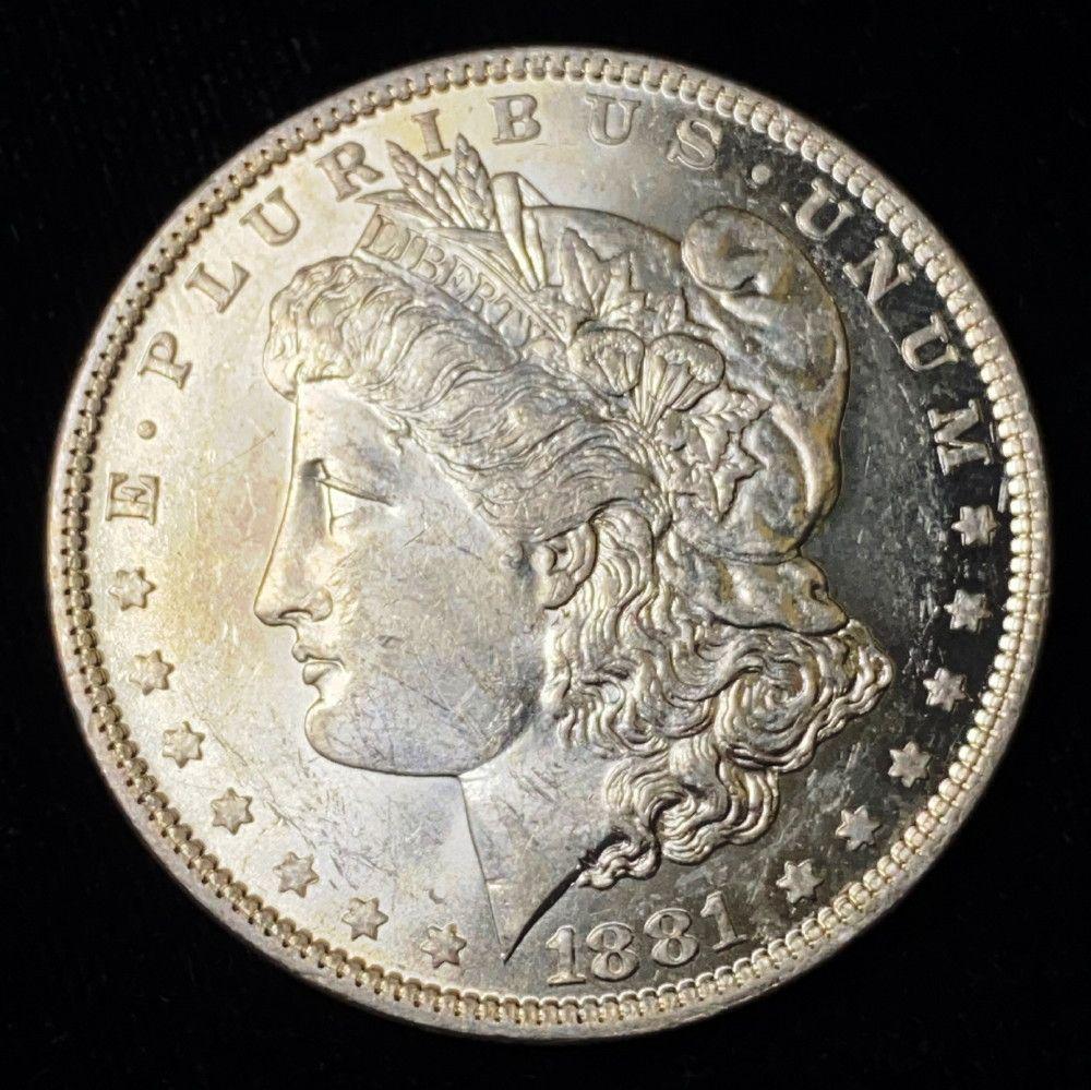 1881-O Morgan Silver Dollar MS63+ (1 of 2)