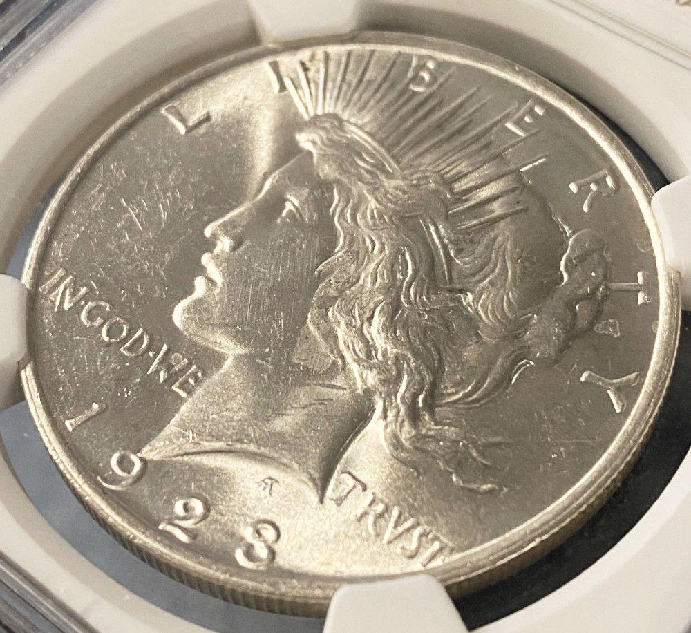 Mint Error 1923 UNC Detail OBV Cleaned NGC Peace Dollar (1 of 3)
