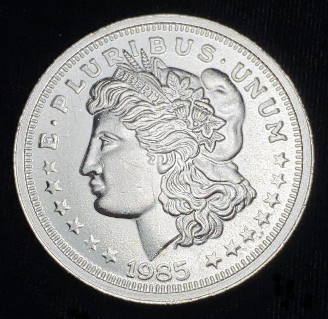 1985 Morgan Design Silver Trade Unit 1oz .999 Slvr: Winner shall receive the exact silver round shown here. (ML/LP)