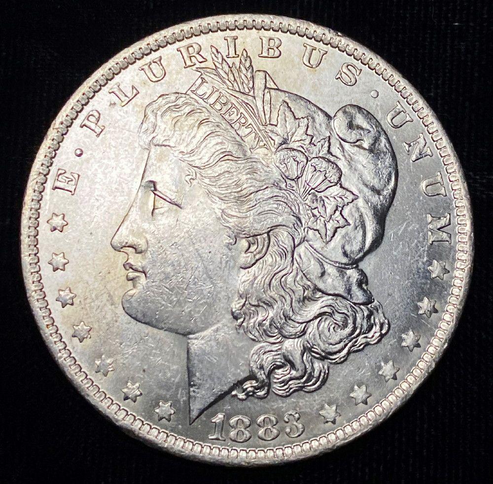 1883-O Morgan Silver Dollar MS63: Winner shall receive the exact coin shown here. (EM/ UB)
