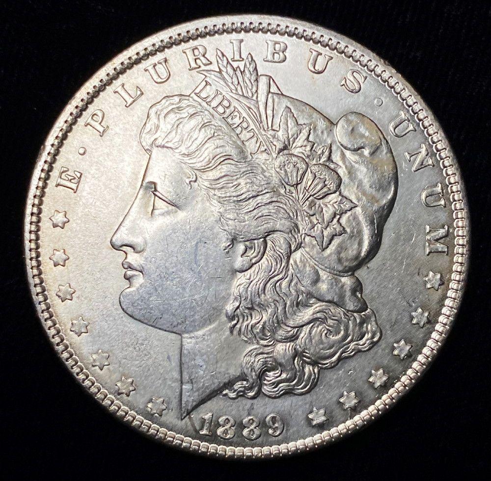 1889 Morgan Silver Dollar AU (1 of 2)
