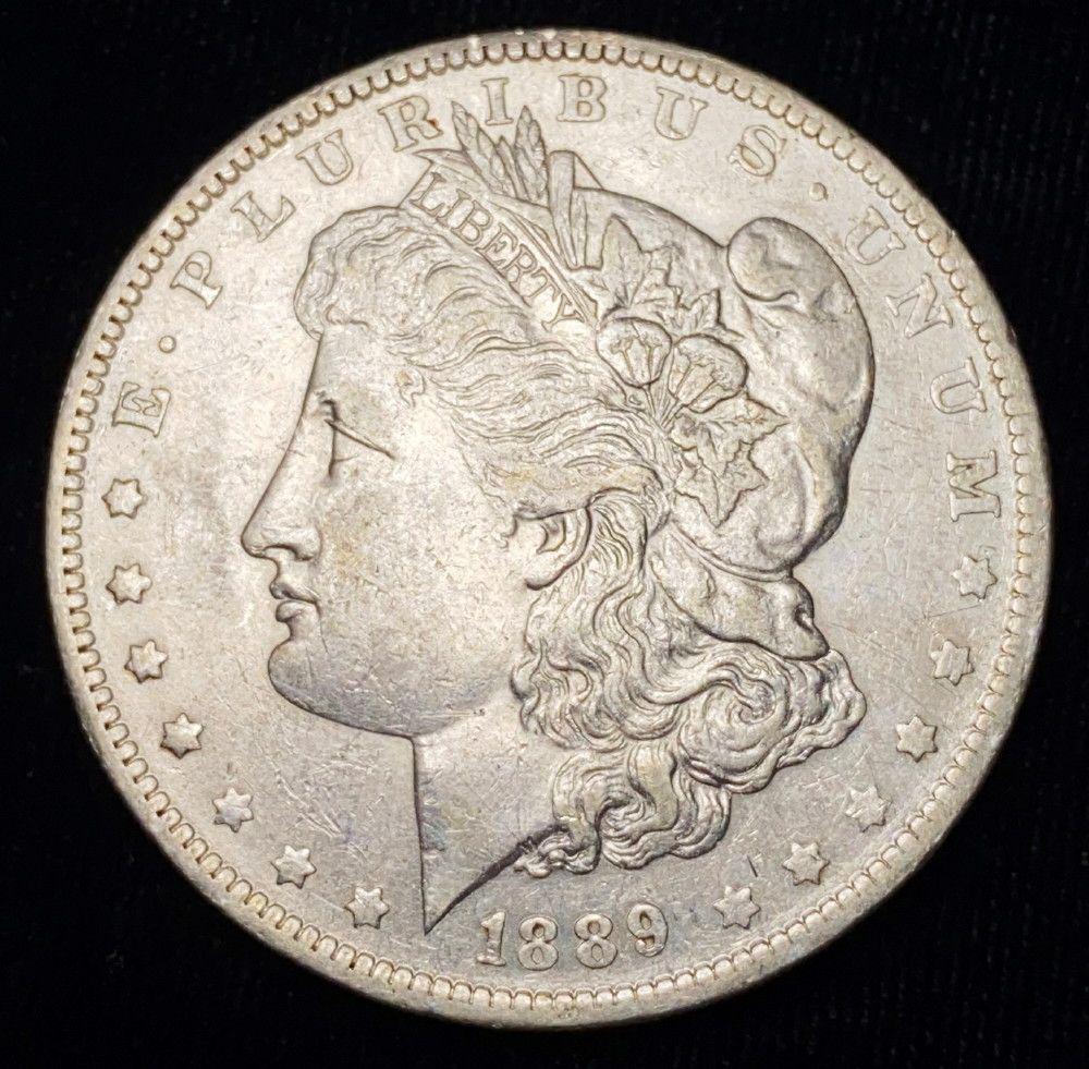 1889-O Morgan Silver Dollar AU (1 of 2)