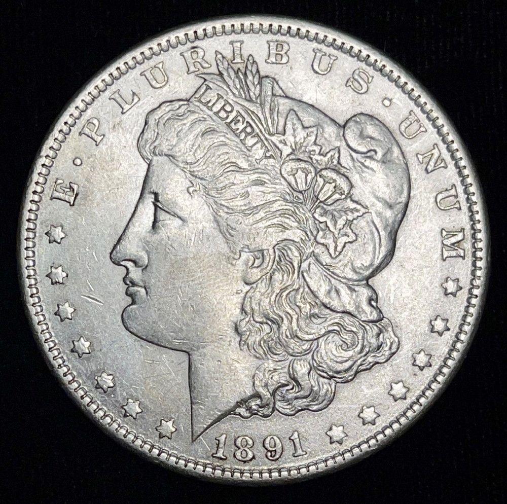 1891 Morgan Silver Dollar VF: Winner shall receive the exact coin shown here. (IS/UB)