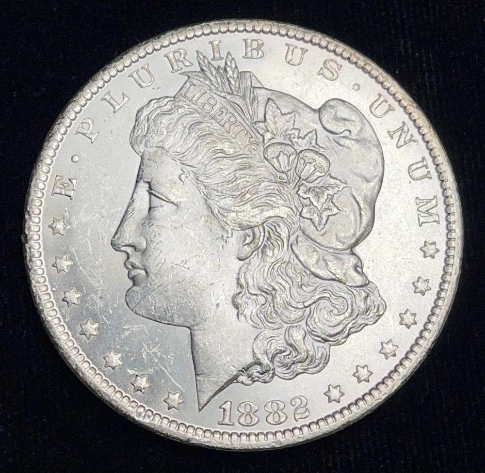 1882-CC Morgan Silver Dollar MS63 (1 of 3)
