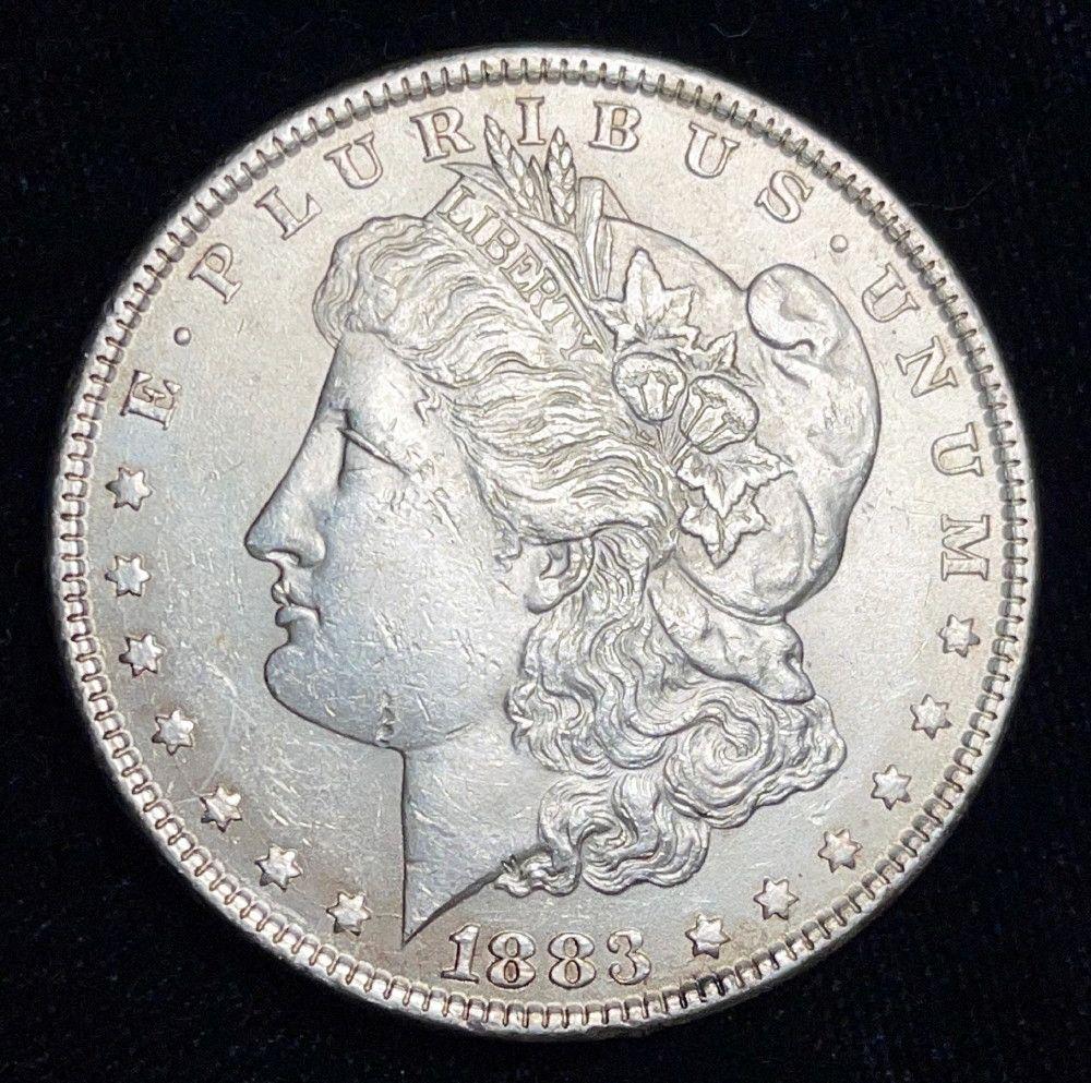 1883 Morgan Silver Dollar AU (1 of 3)