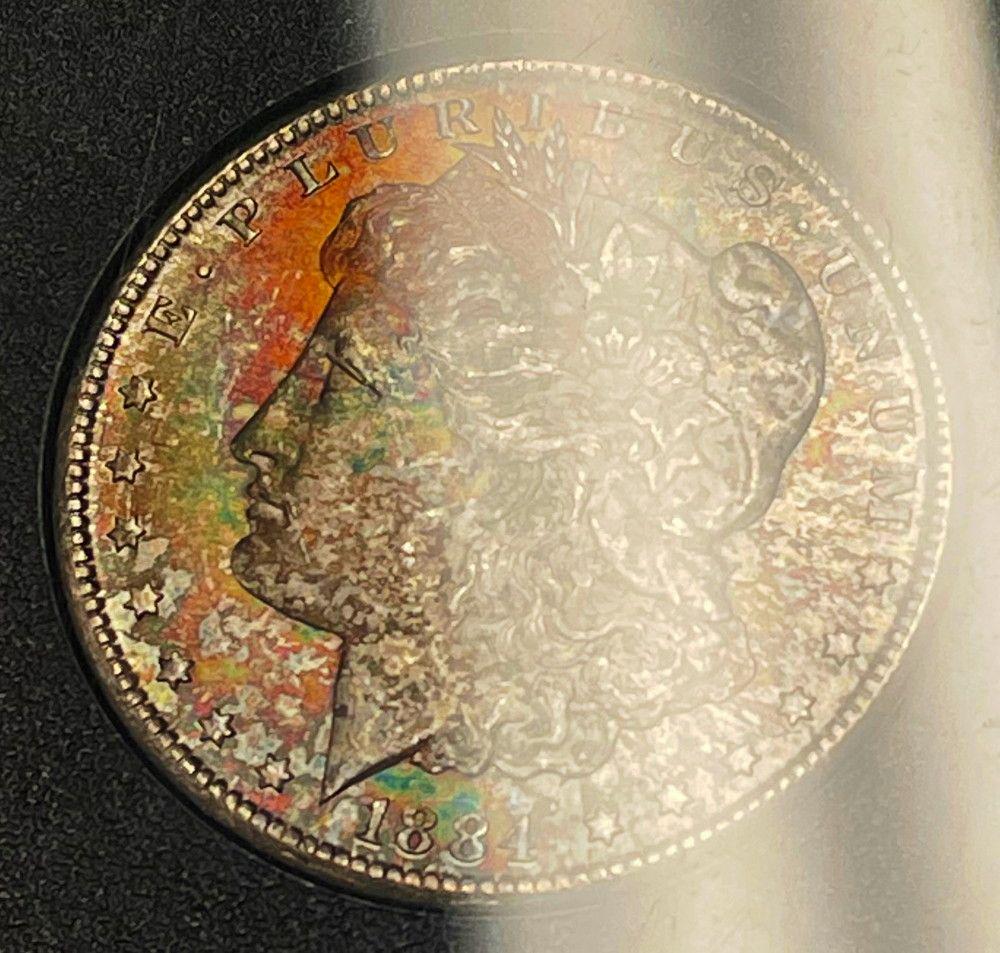 Rainbow 1884-CC Carson City Morgan Slvr $1 NGC GSA MS65 (1 of 10)