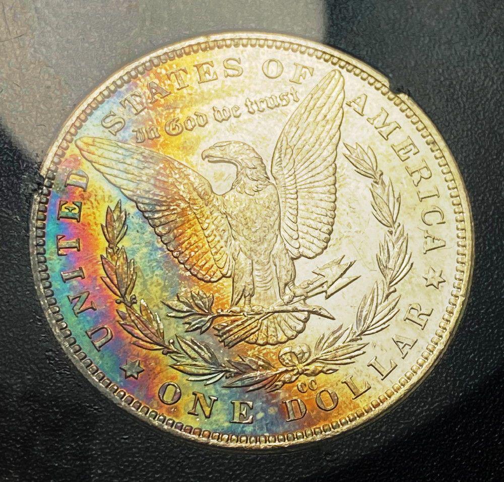 Monster Rainbow GSA 1883-CC NGC MS64: Winner shall receive the ecact coin shown here. (EM/PBB)