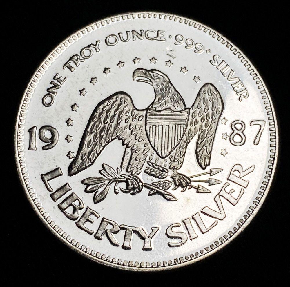 1987 Hoffman Liberty Flying Eagle 1oz Silver: Winner shall receive a coin precisely resembling the coin shown here. (EM/UB)