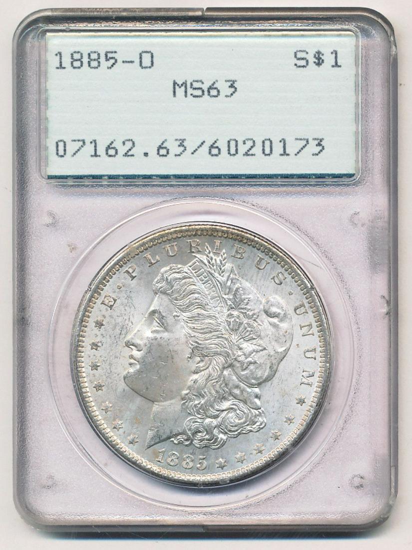 1885-O Morgan Silver Dollar OGH PCGS MS63: This coin was certified sometime shortly after PCGS began opperating in 1986.Winner shall recieve the exact coin shown here. (EM/OR)