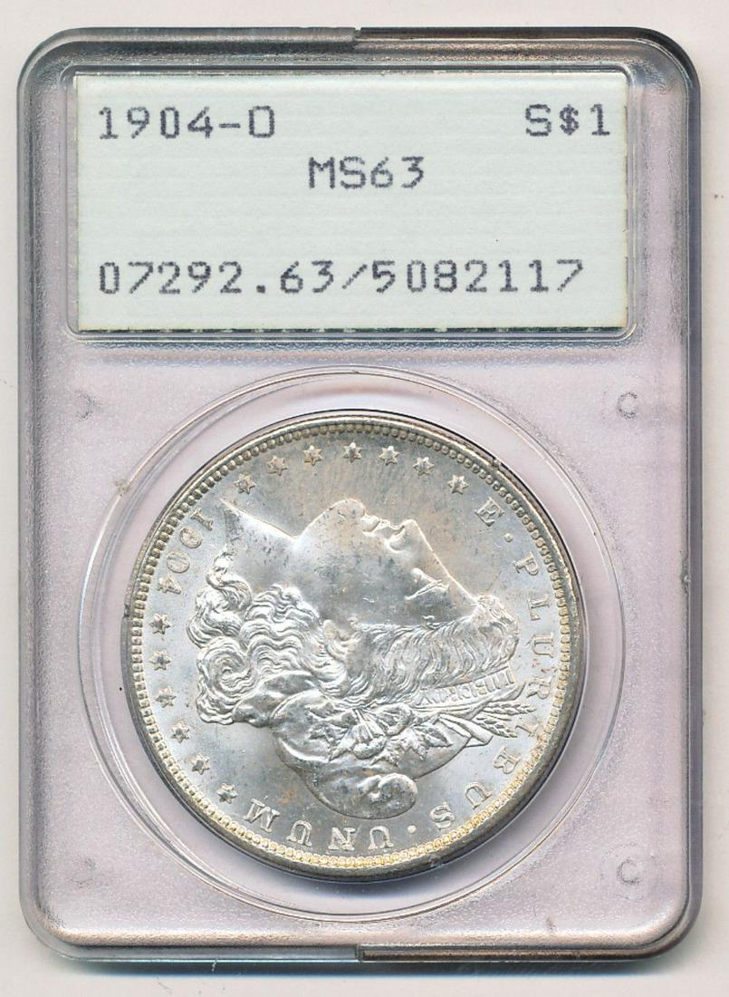 1904-O Morgan Silver Dollar OGH PCGS MS63: This coin was certified sometime shortly after PCGS began opperating in 1986.Winner shall recieve the exact coin shown here. (EM/OR)