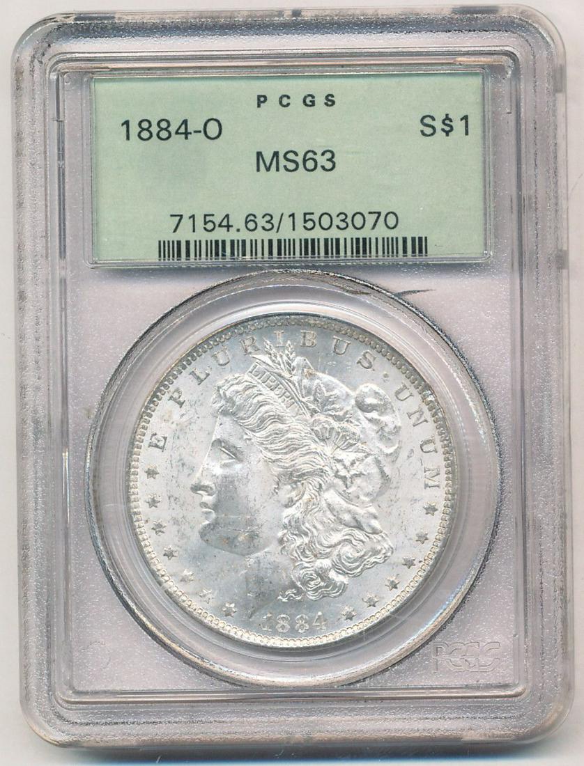 1884-O Morgan Silver Dollar OGH PCGS MS63: This coin was certified sometime shortly after PCGS began opperating in 1986.Winner shall recieve the exact coin shown here. (EM/OR)