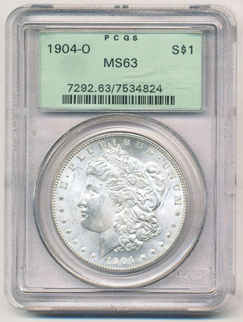 1904-O Morgan Silver Dollar OGH PCGS MS63: This coin was certified sometime shortly after PCGS began opperating in 1986.Winner shall recieve the exact coin shown here. (EM/OR)