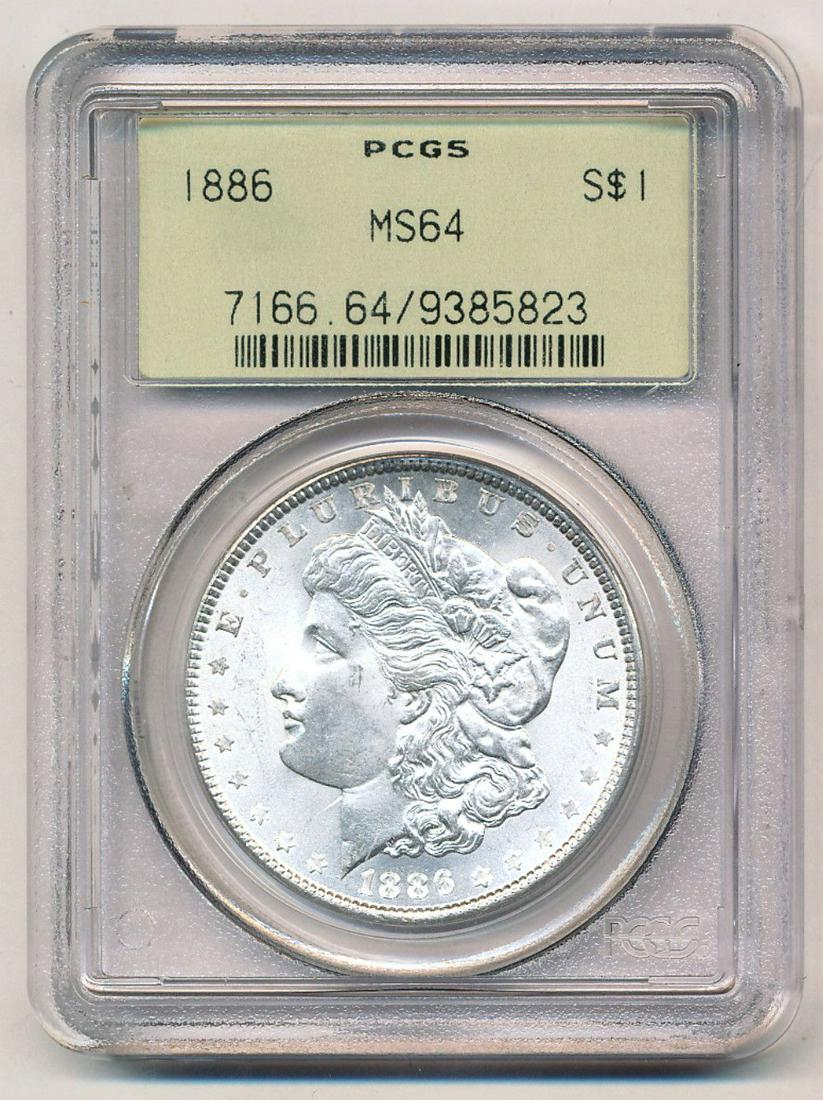 1886 Morgan Silver Dollar OGH PCGS MS64: This coin was certified sometime shortly after PCGS began opperating in 1986.Winner shall recieve the exact coin shown here. (EM/IR)