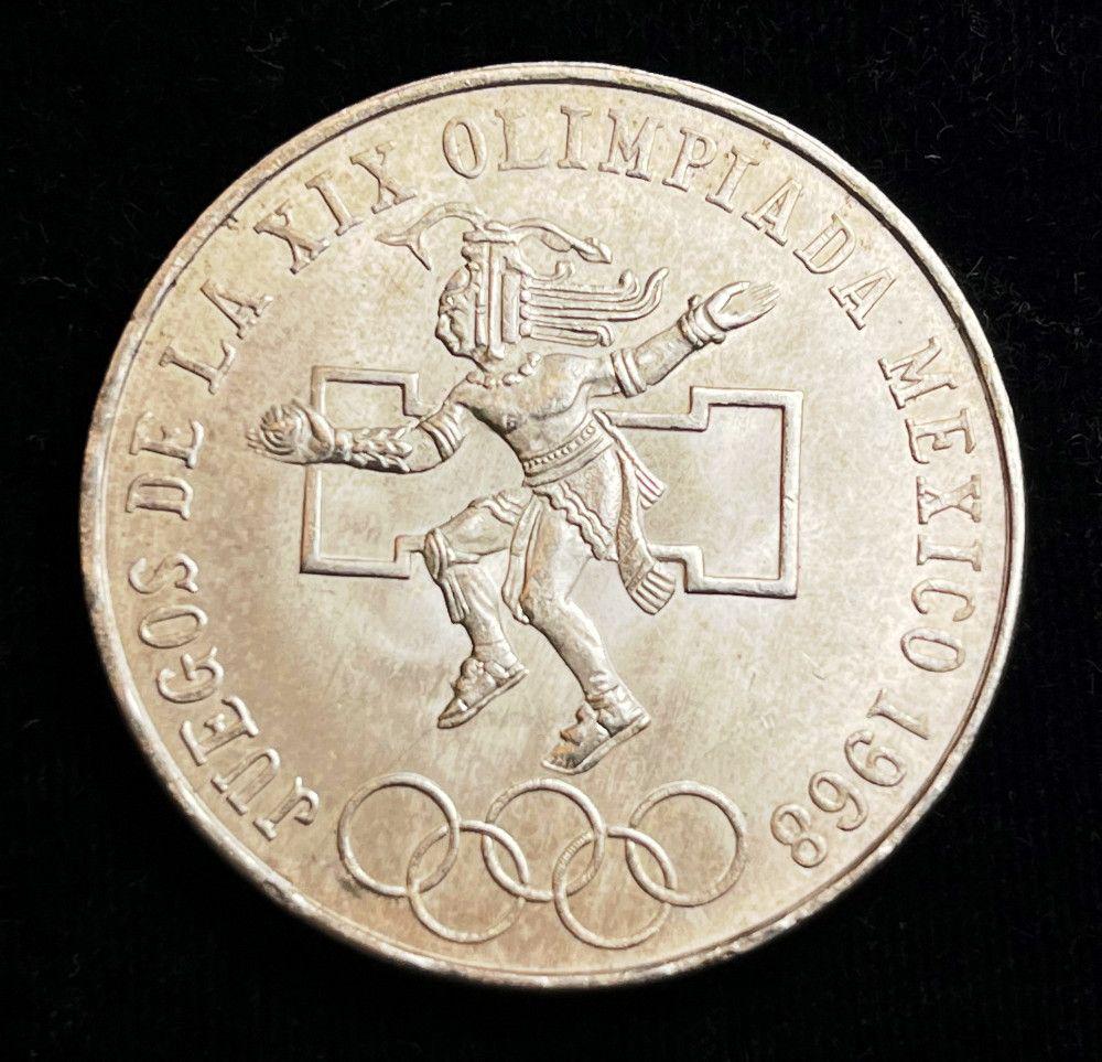 1968 Olympic Games 25 Pesos .79 oz Silver: Winner shall receive the exact coin shown here. (EM/B)