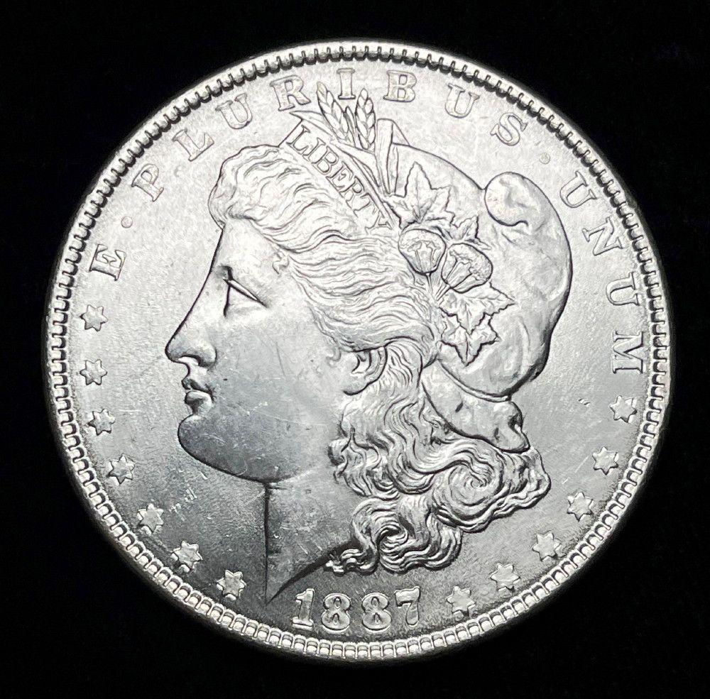 1887 Morgan Silver Dollar MS63 or Above (1 of 2)