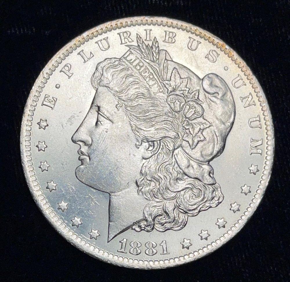 1881-O Morgan Silver Dollar MS63 or Above (1 of 2)