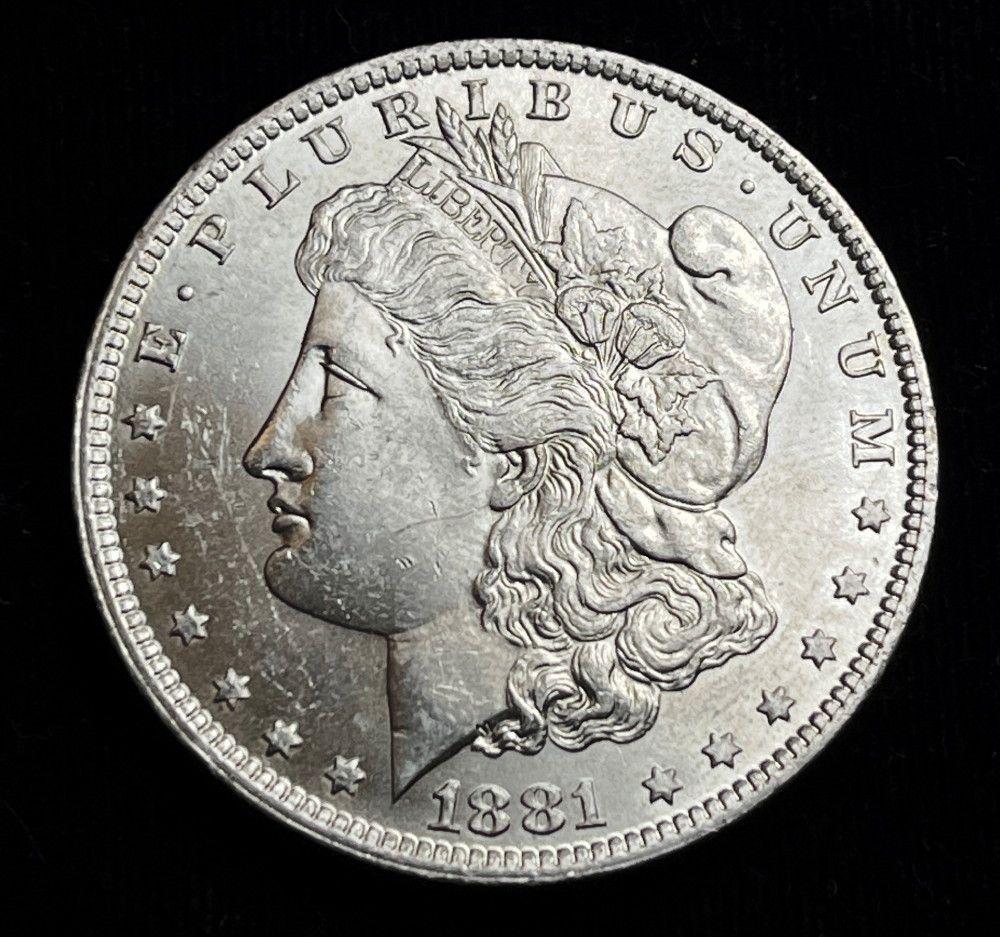 1881-O Morgan Silver Dollar MS64 or Above (1 of 2)