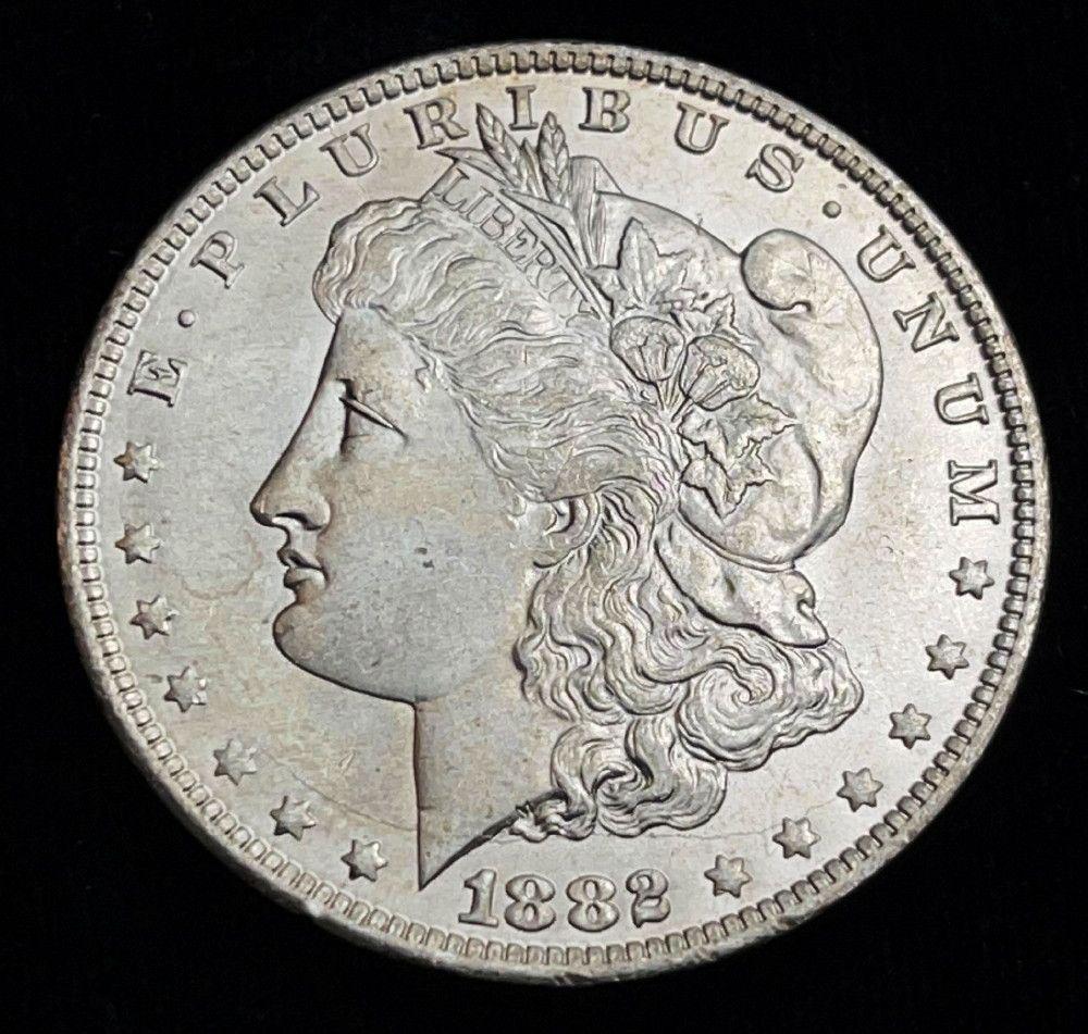 1882-O Morgan Silver Dollar MS64 or Above (1 of 2)