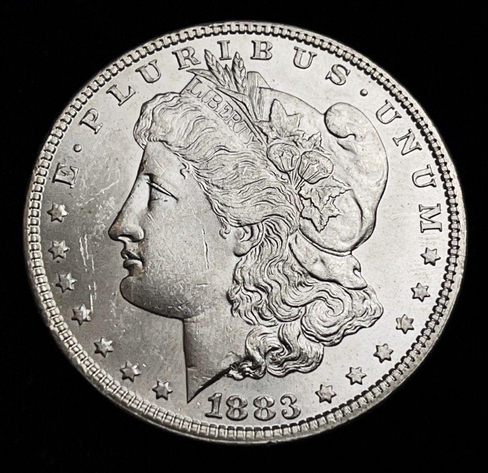 1883 Morgan Silver Dollar MS64 or Above (1 of 2)