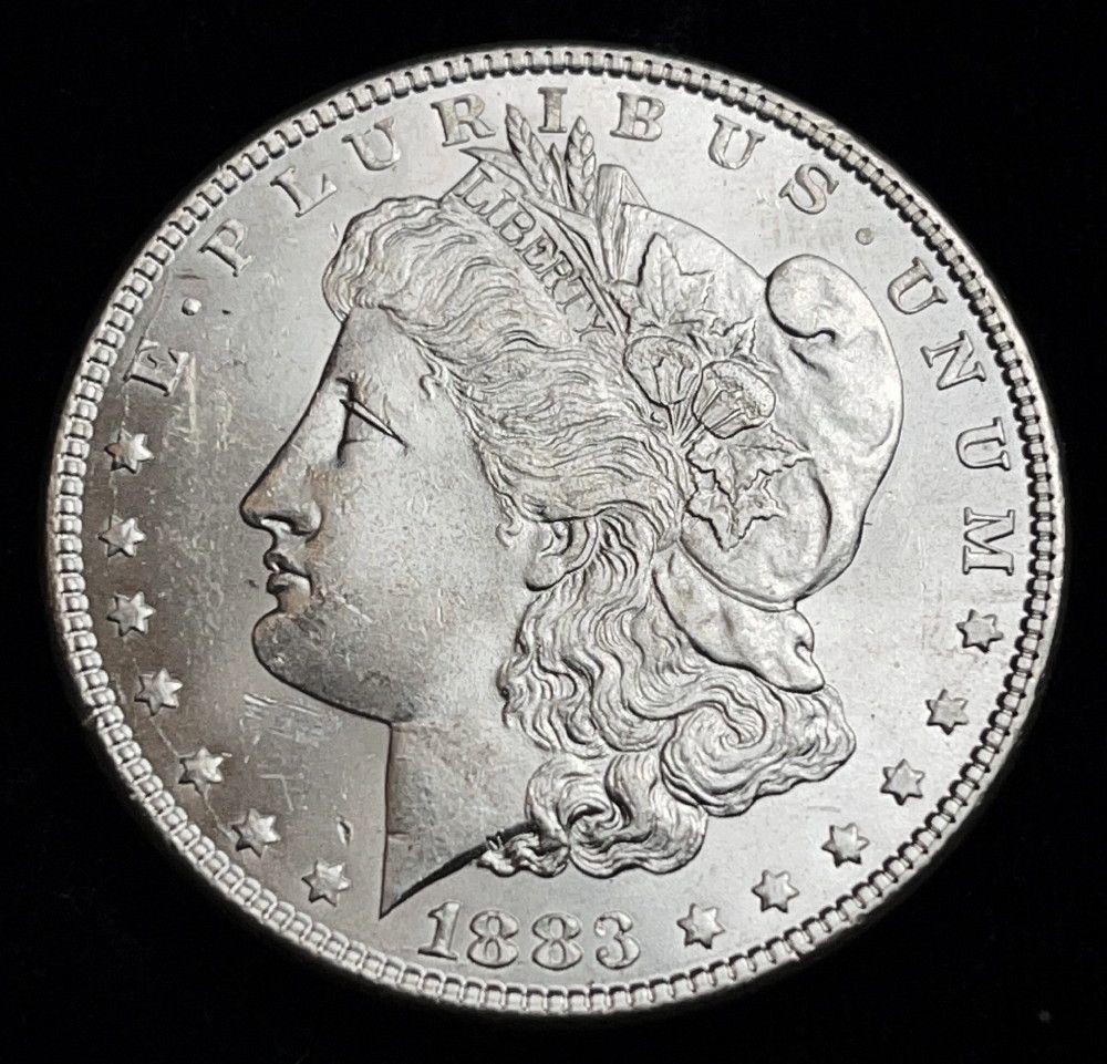 1883 Morgan Silver Dollar MS64 or Above (1 of 2)