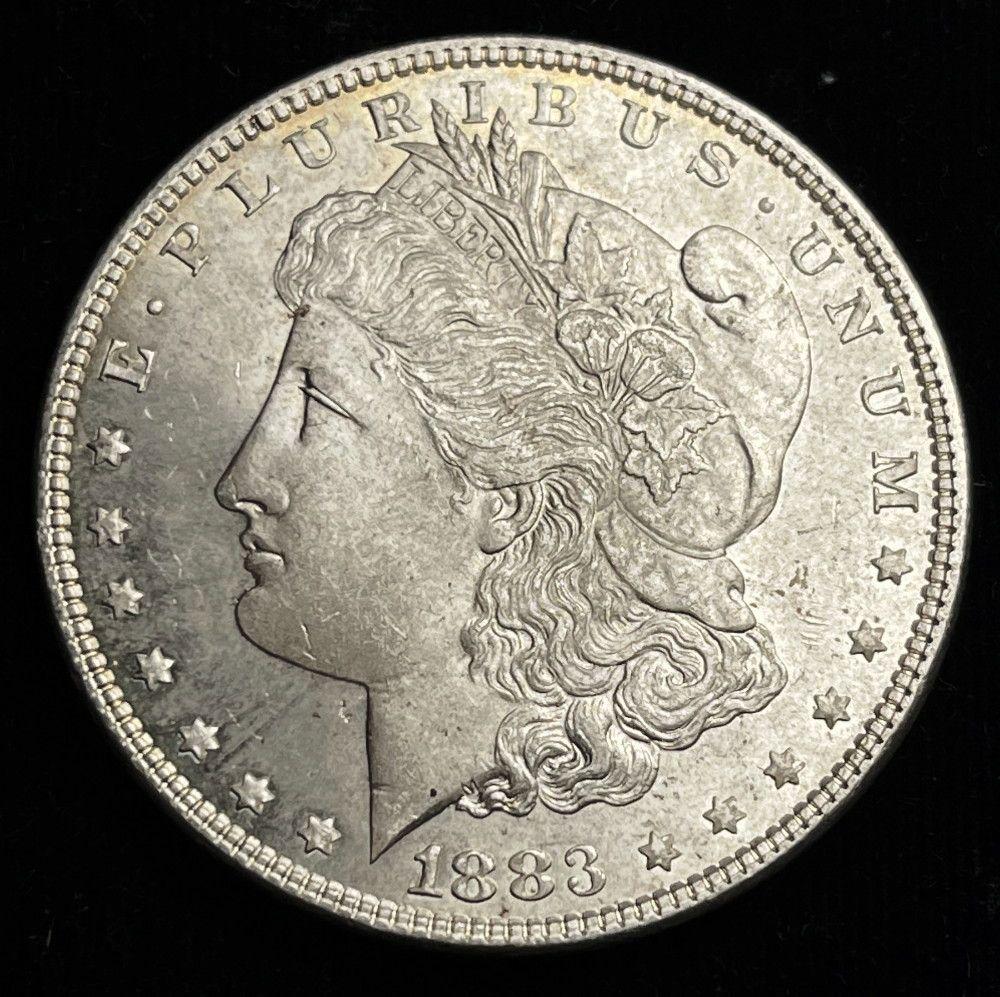 1883 Morgan Silver Dollar MS64 or Above (1 of 2)