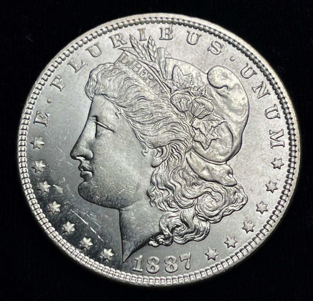 1887 Morgan Silver Dollar MS64 or Above (1 of 2)