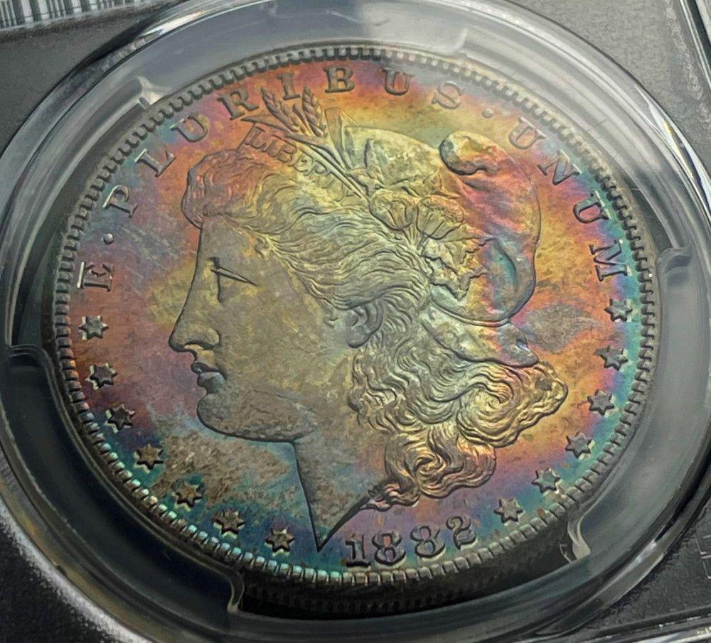 Amazing Rainbow 1882-S Morgan Silver Dollar PCGS MS65: Disclaimer: If you are bidding over the LiveAuctioneers platform, this lot will be accessed a special 5% buyers premium. In other words, if you win this lot for $100,000 "hypothetical", your bill for