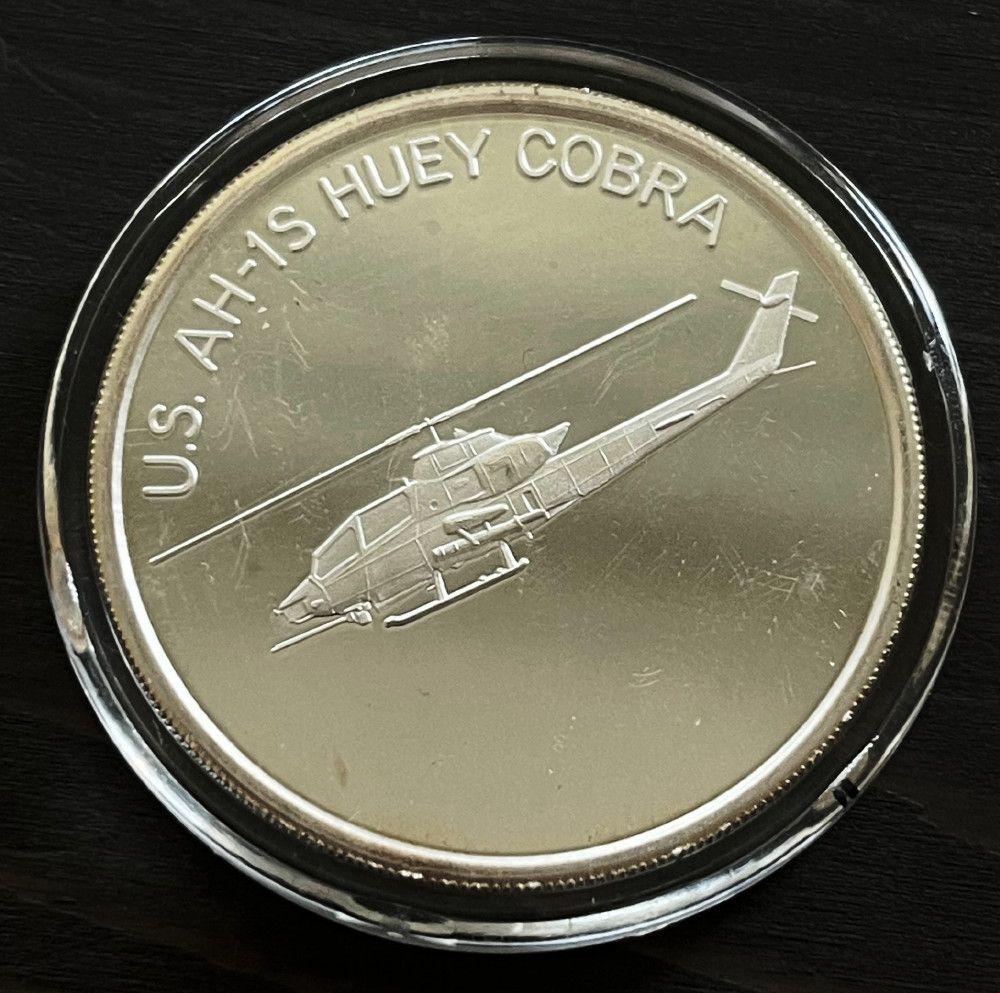 Saudi Arabia Desert Shield US AH-1S Huey Cobra 1oz Slvr: Saudi Arabia Desert Shield U.S. AH-1S Huey Cobra 1 oz SilverWinner shall receive the exact coin shown here. (EM)