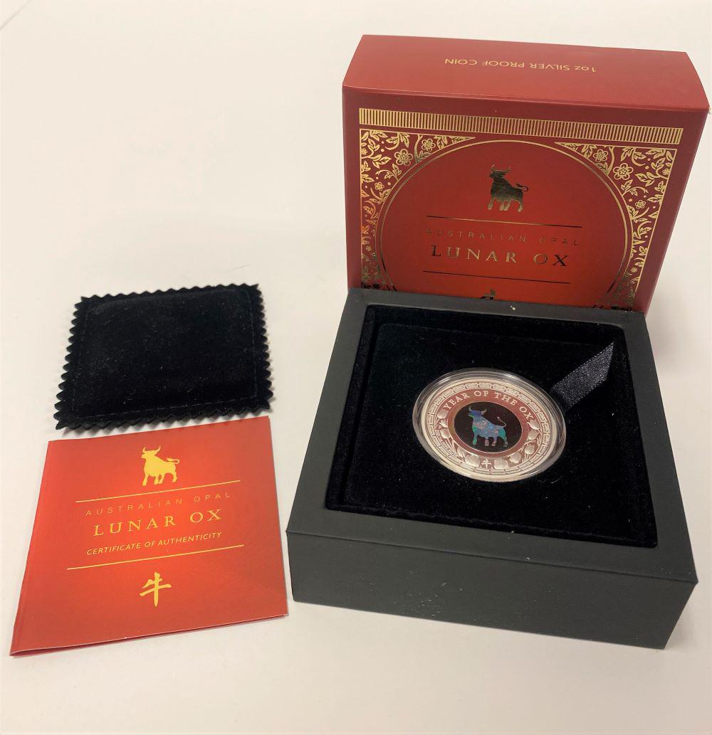 2021 Australian Opal Lunar Year Of Ox 1 oz Silver Proof: 2021 $1 Australian Opal Lunar Year Of The Ox 1 oz Silver ProofWinner shall receive the exact set shown here. (EM)