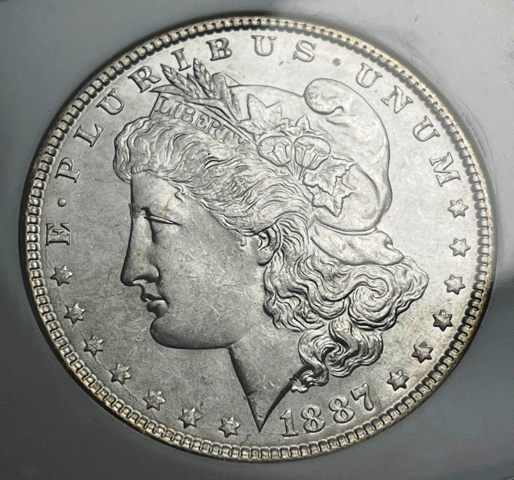 1887 Morgan Silver Dollar NGC MS64 (1 of 4)