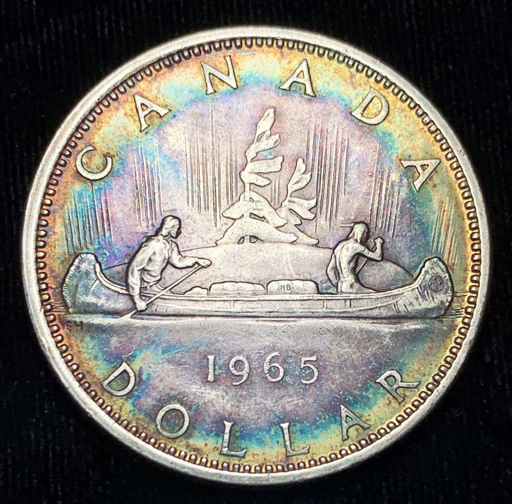 Toned 1965 Canada 80% Silver Dollar (1 of 2)