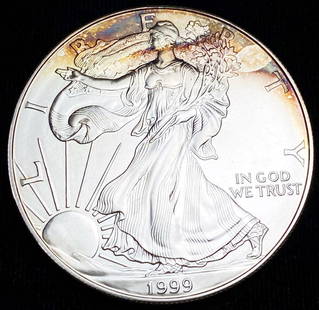 1999 American Silver Eagle with Toning: Winner shall receive the exact coin shown here. (RR/UI)