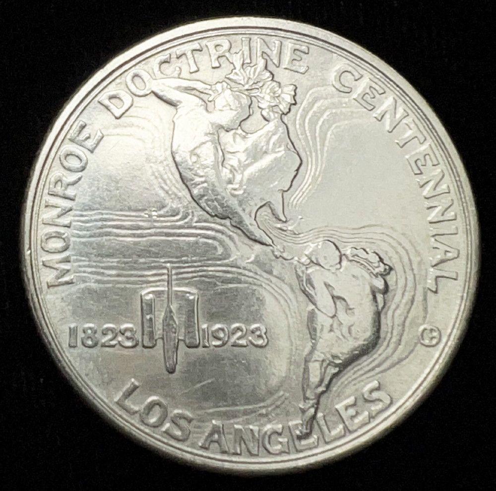 1923 Monroe 50C Commemorative AU55: Winner shall receive the exact coin shown here. (IS/B)