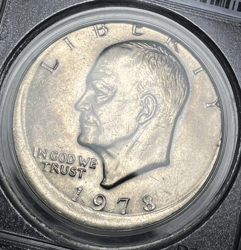 Off Center Mint Error 1978 Eisenhower Dollar PCGS MS63: Off Center Mint Error 1978 Eisenhower Dollar Struck 10% Off Center PCGS MS63Winner shall receive the exact coin shown here. (RR)