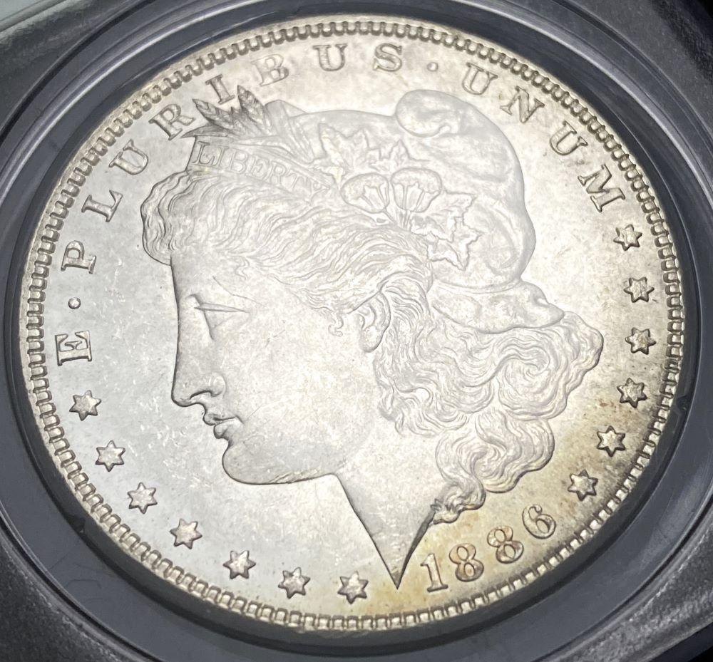 1886 Morgan Silver Dollar PCGS OGH MS63 (1 of 4)