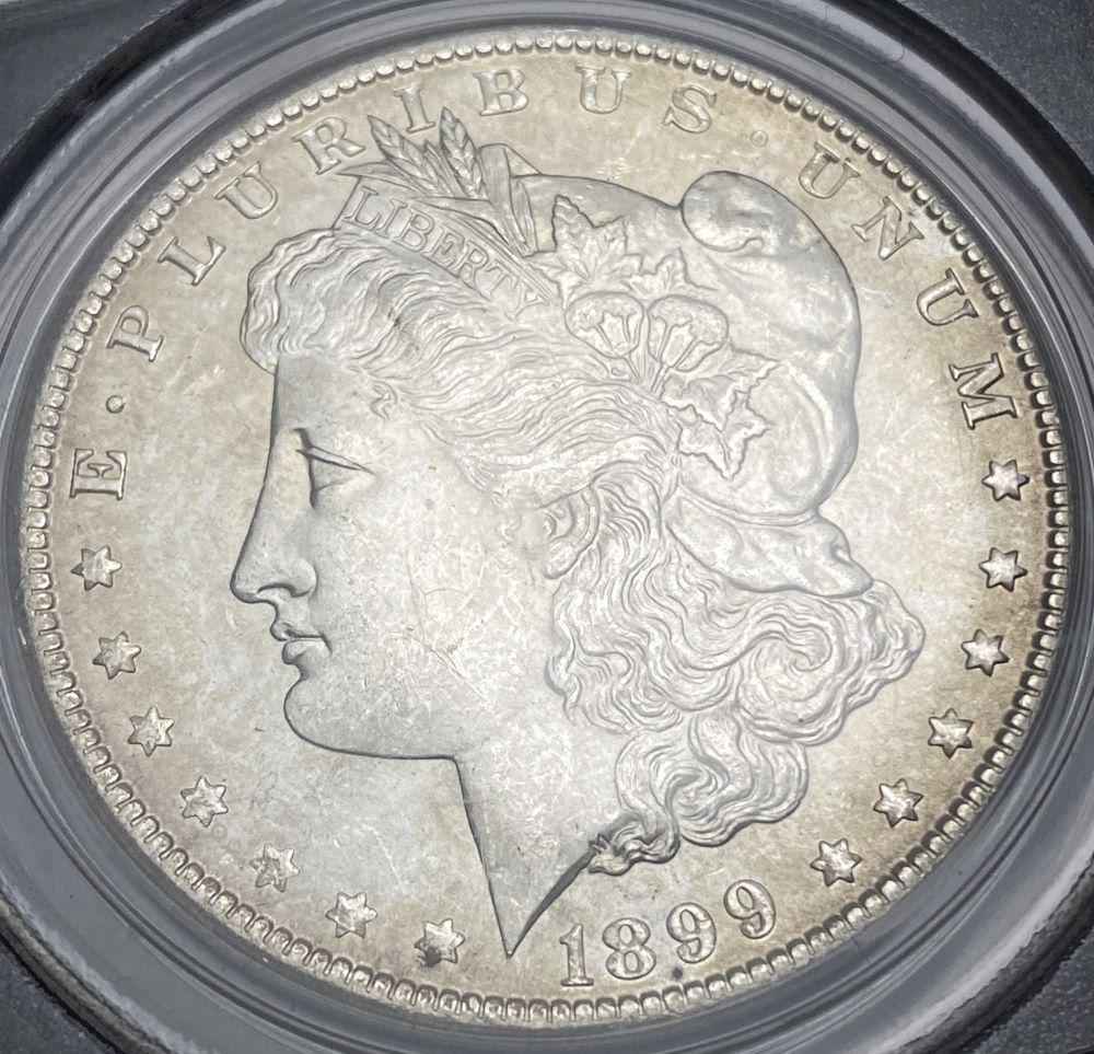 1899-O Morgan Silver Dollar PCGS MS63 OGH (1 of 4)