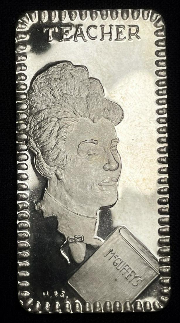 The Hamilton Mint teacher 1 ozt .999 Silver Bar: Winner shall receive the exact bar shown here. (JM)