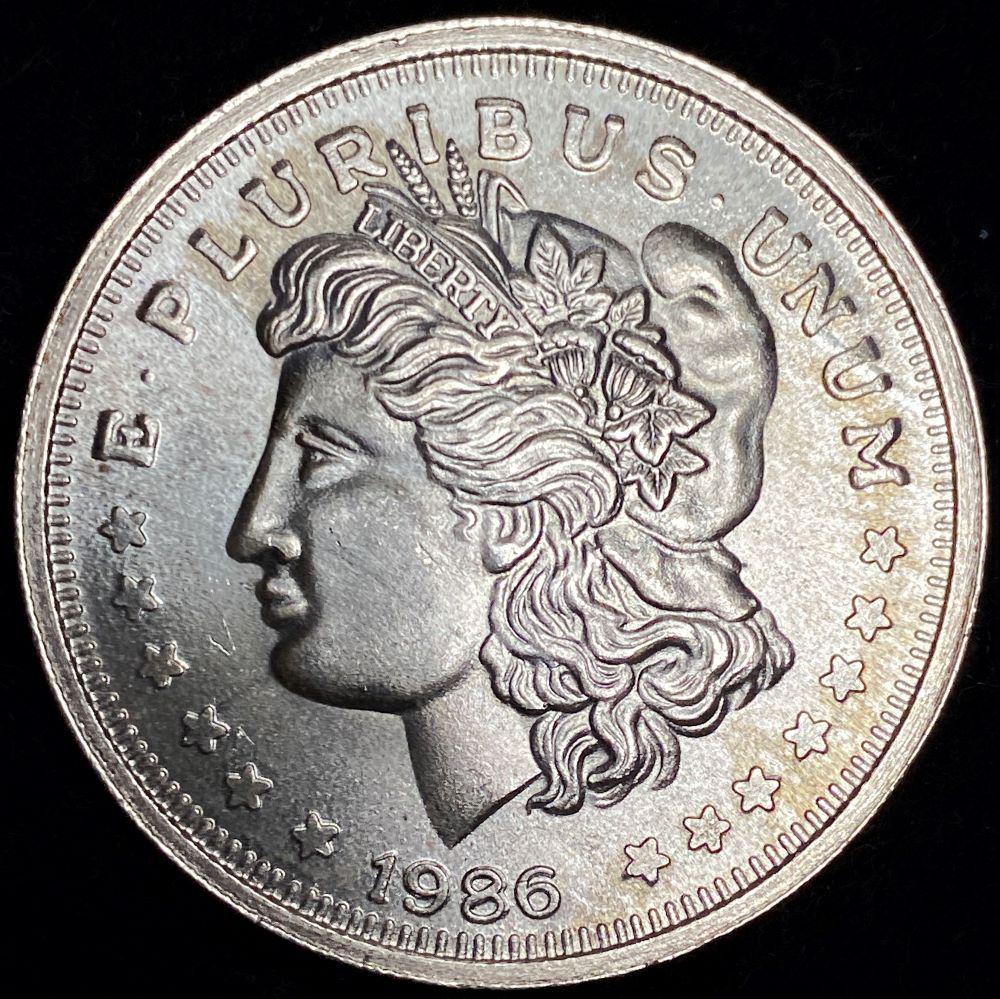 1986 Morgan Dollar Design 1 ozt .999 Silver: Winner shall receive the exact coin shown here. (AZ/B)