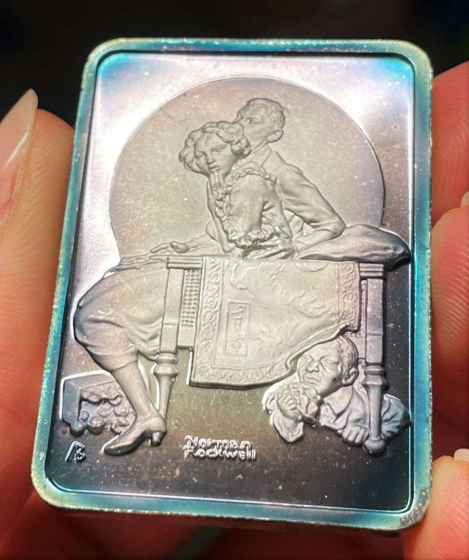 Spot Light Rainbow Toning "The Undercover Man" 1921 Norman Rockwell 1 ozt .999 Silver Bar: Winner shall receive the exact bar shown here. (JM/B)