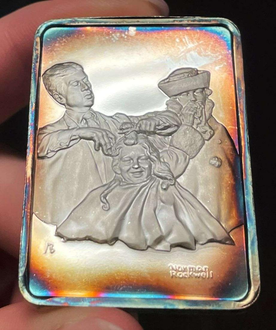 Spot Light Rainbow Toning "The First Haircut" 1918 Norman Rockwell 1 ozt .999 Silver Bar: Winner shall receive the exact bar shown here. (JM/B)