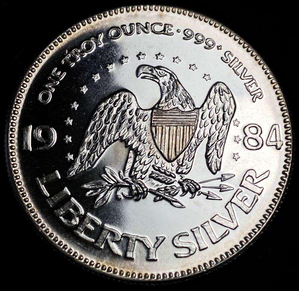 1984 A-Mark "Life Liberty Happiness" Proof 1 ozt .999 Silver: Winner shall receive the exact coin shown here. (RR/B)