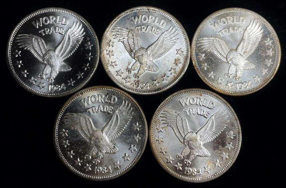 (5) 1984 World Trade Eagle One World Unit 1 ozt .999 Silver: Winner shall receive the exact coins (5) shown here. (JM/TVC=LUB)