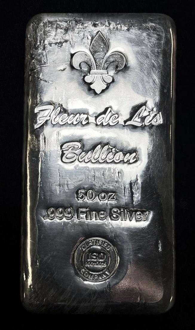 (1) 50 ozt .999 Fine Silver Fleur De Lis Bullion: This item comes from our consignors vault in St. Louis. Please allow 2-4 weeks for delivery. Winner shall receive ONE (1) 50 oz .999 silver bar, precisely resembling the bar shown here.