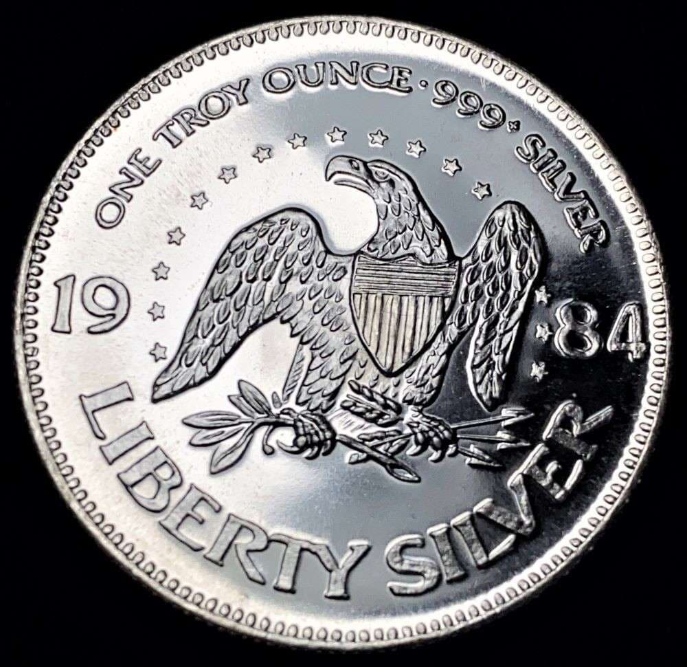 1984 A-Mark "Life Liberty Happiness" Proof 1 ozt .999 Silver: Winner shall receive the exact coin shown here. (RR/B)