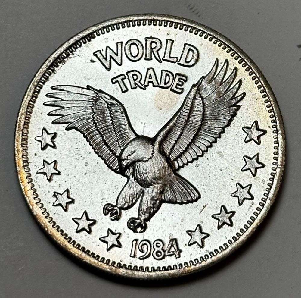 1984 World Trade Eagle One World Trade Unit 1 ozt .999 Silver: Winner shall receive the exact coin shown here. (JM/B)